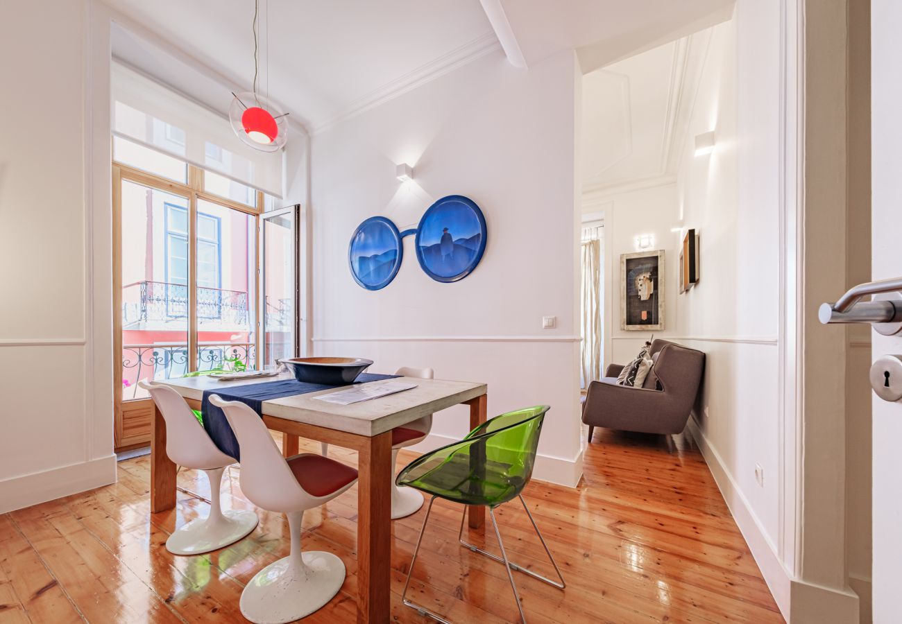 Charming dining room with neutral tones and loads of natural light